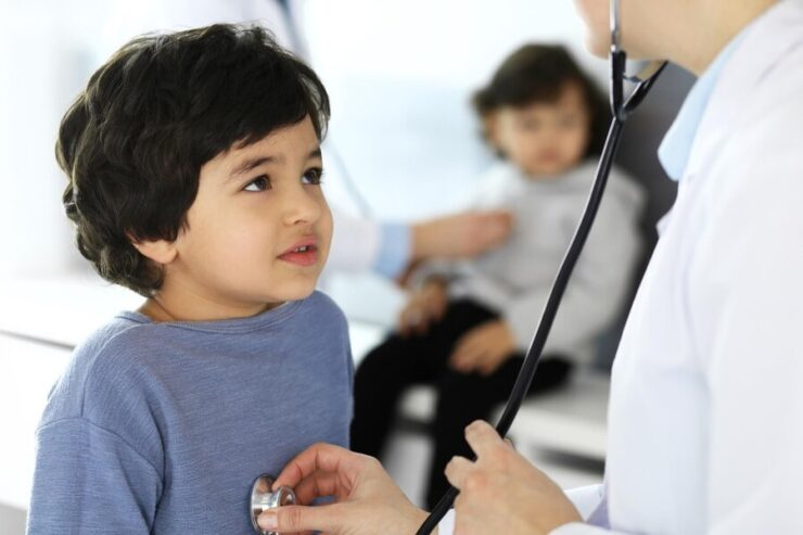 doctor-examining-child-patient-by-stethoscope-cute-arab-boy-physician-appointment-medicine-healthcare-concept_735658-363